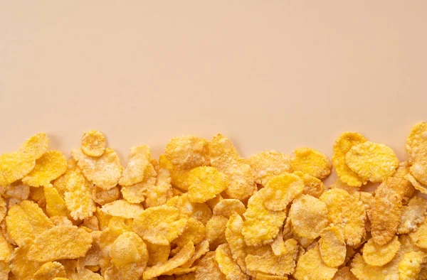 Beige Hintergrund Mit Cornflakes Lebensmittel Hintergrund Blick Von Oben — Stockfoto