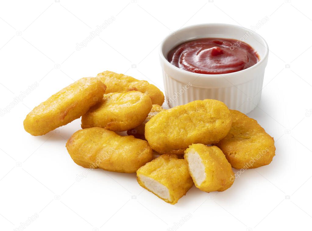 Chicken nuggets and tomato ketchup on a white background.