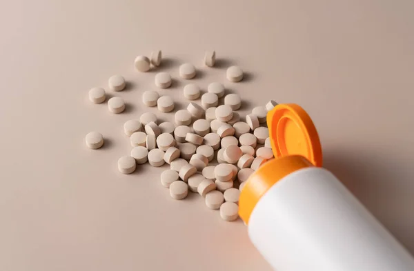 Pills Spilling Out Bottle Beige Background Concept Pharmaceuticals Supplements — Stock Photo, Image