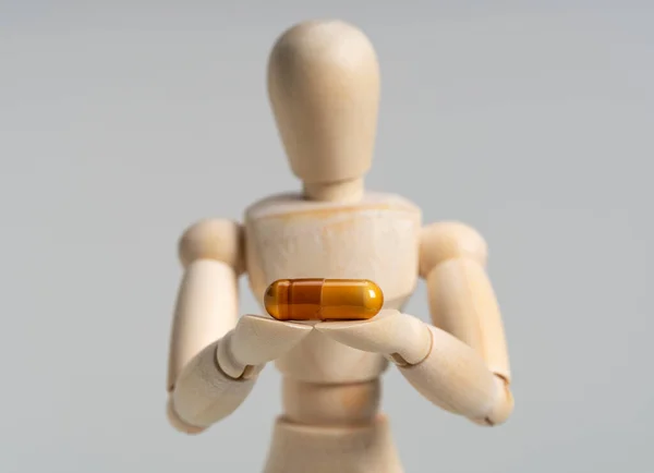 Wooden Mannequin Pills White Background Concept Pharmaceuticals Supplements — Stock Photo, Image