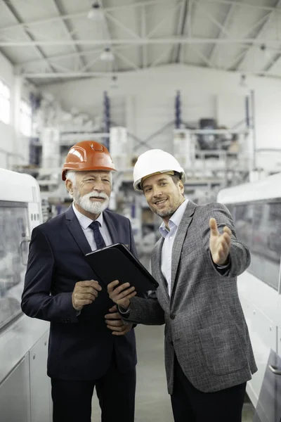 Colleagues Talking Business Factory Architects Working Project Royalty Free Stock Images