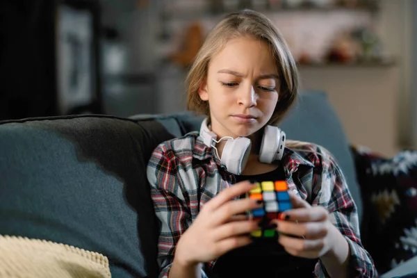 Young Blonde Girl Playing Rubik Cube — Stock Photo, Image