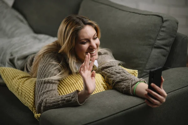 Happy Young Woman Lie Sofa Have Video Call Home Loft — Stock Photo, Image