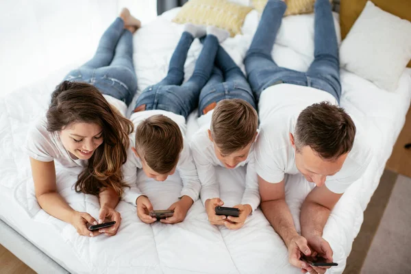 Family Using Mobile Phones Parents Kids Using Smart Phones Home — Stock Photo, Image