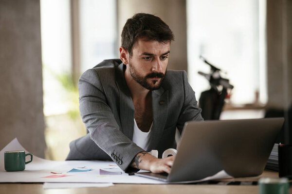 Young Businessman Using Computer His Office Handsome Man Working His Stock Image