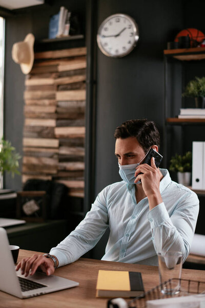 Businessman Using Phone Young Businessman Medical Mask Working His Office Royalty Free Stock Photos