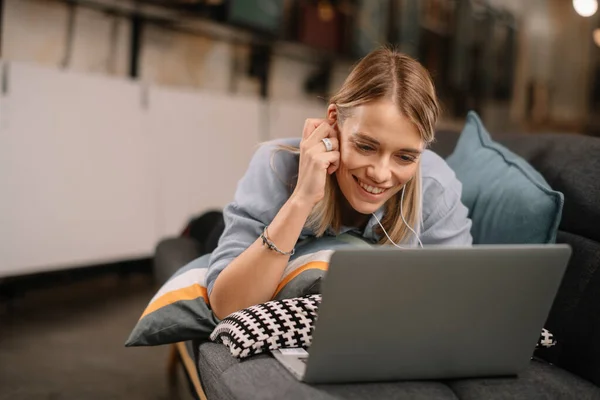 Young Woman Lie Sofa Listen Music Laptop — Stock Photo, Image