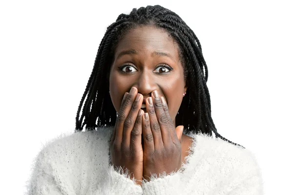 African teen girl with hands on mouth. — Stock Photo, Image