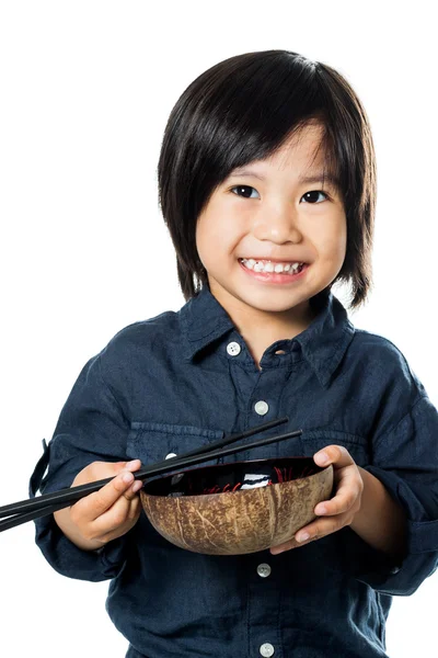 Menino com pauzinhos e tigela . — Fotografia de Stock