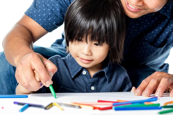 Dad helping little boy with drawings — Stock Photo, Image