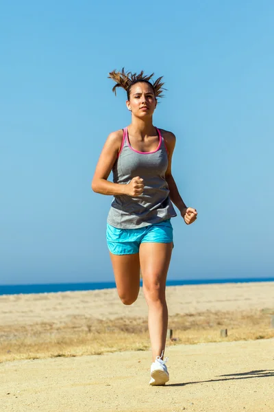 Young woman running to camera. — Stock Photo, Image