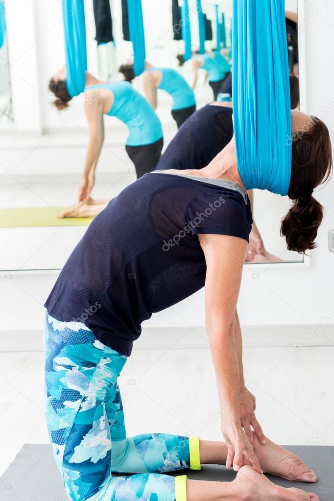 Women doing neck exercise.