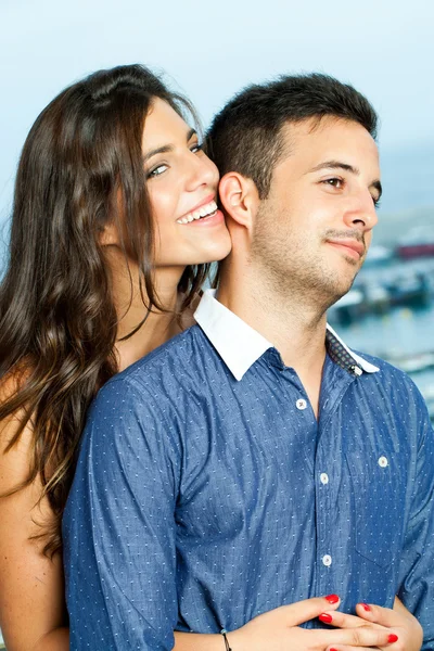 Sensual girl holding boyfriend. — Stock Photo, Image