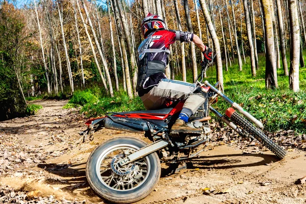 Motocross rider doing spin. — Stock Photo, Image