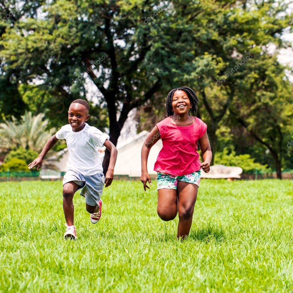 A group of african children playing in a park