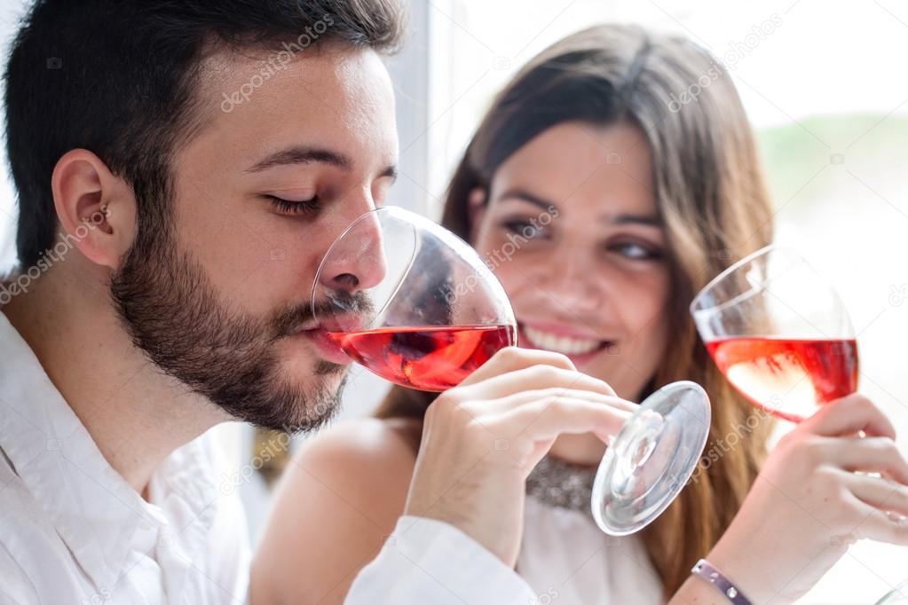 Couple enjoying wine tasting. Stock Photo by ©karelnoppe 68672689