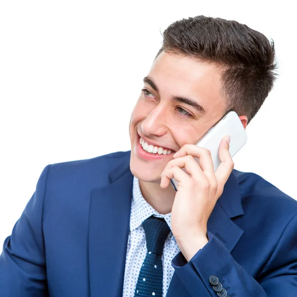 Hombre de negocios guapo hablando por teléfono inteligente . —  Fotos de Stock