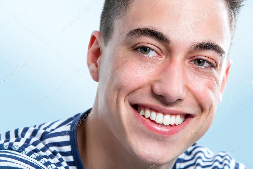 Young man with healthy teeth