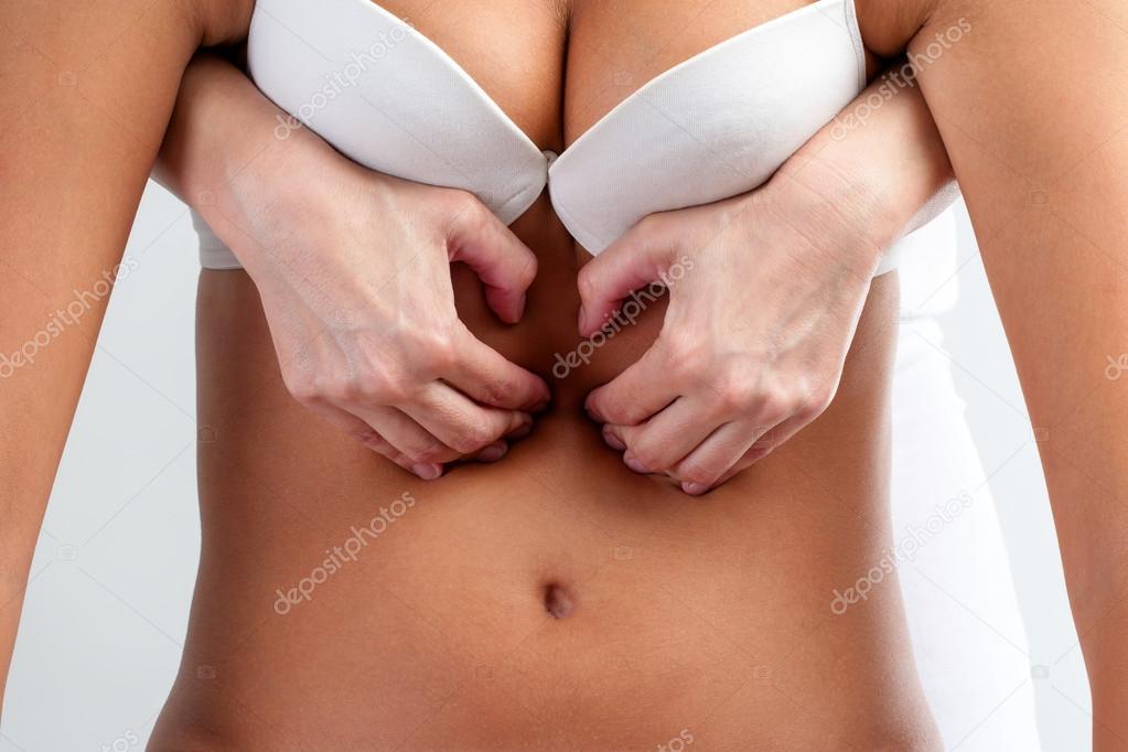 hands pressing womans thorax