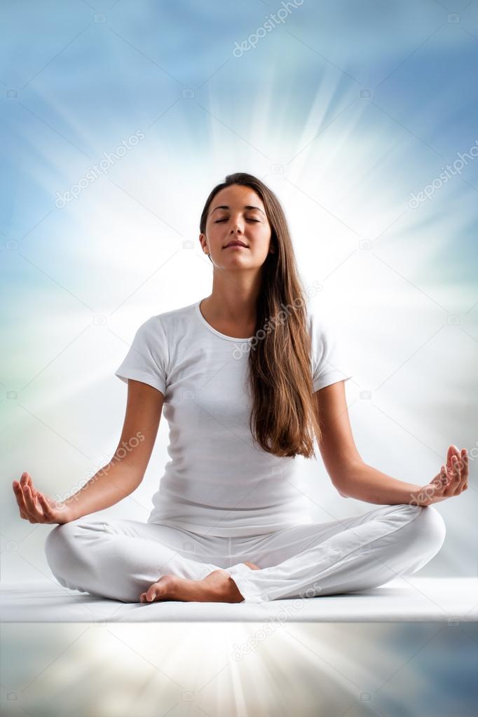 Woman meditating with closed eyes Stock Photo by ©karelnoppe 77620044