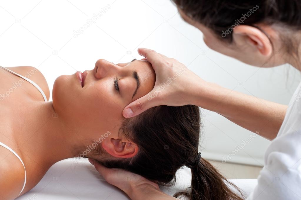 healing treatment on womans head.