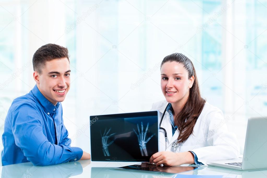 medical students with x-rays and laptop