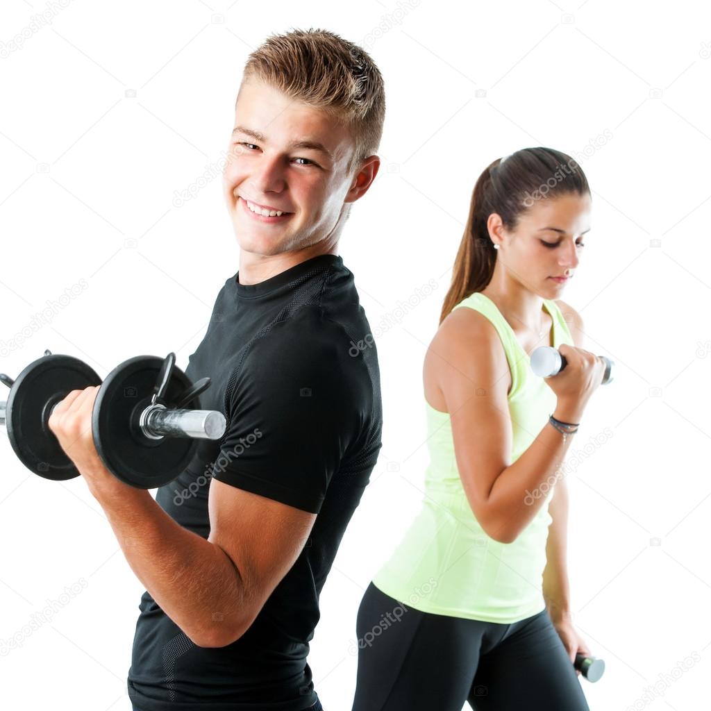 boy and girl working out with weights