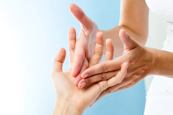 Hands doing curative massage — Stock Photo, Image