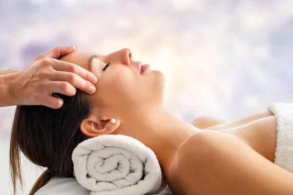 Young woman having facial massage — Stock Photo, Image