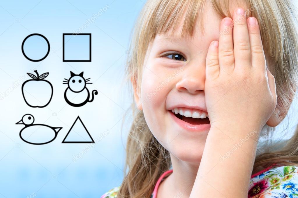 Kid testing vision with symbols.