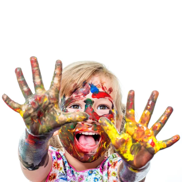 Chica con las manos pintadas y la cara . — Foto de Stock