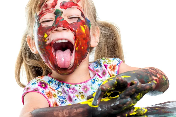 Meisje met geschilderde handen en gezicht. — Stockfoto