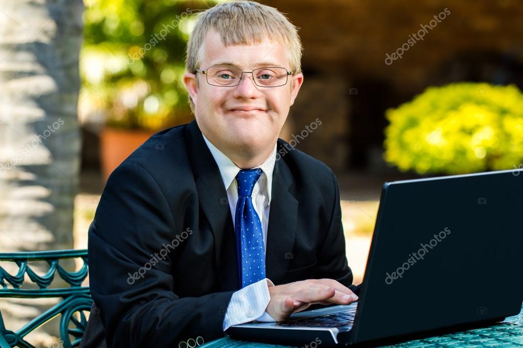 depositphotos_93490052-stock-photo-handicapped-businessman-working-with-laptop.jpg