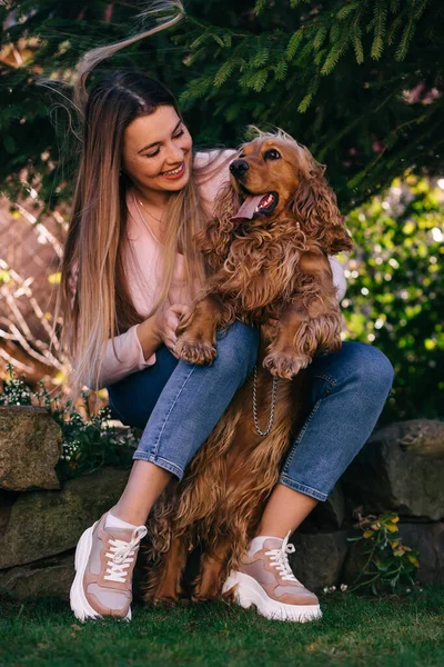 Cheerful Girl Holding Her Dog Looking Him Smiling Young Woman — Stock Photo, Image