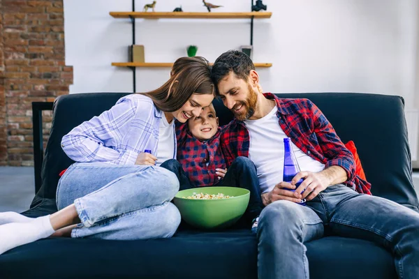 Positive Joyful Family Casual Clothes Jeans Sitting Couch Watching Funny — Stock Photo, Image