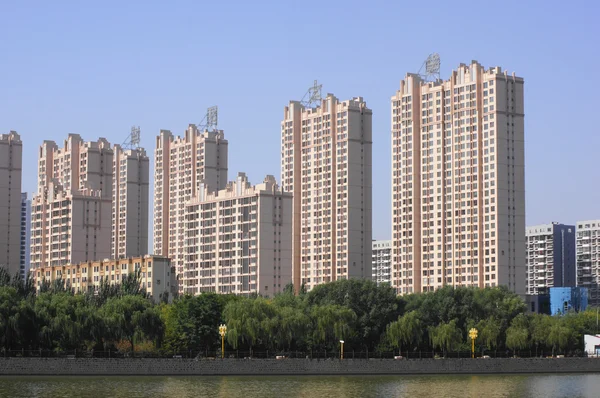 City of Datong (Shanxi, China). Apartment houses on the shore Royalty Free Stock Images