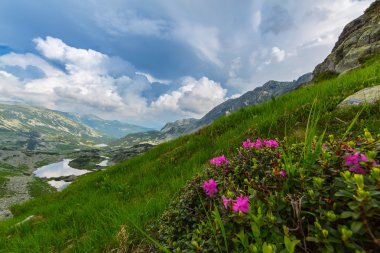 Mountain scenery and storm clouds in the Transylvanian Alps clipart