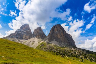 Beautiful cloudscape in the Dolomite mountains in summer