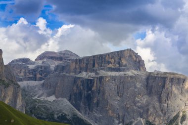 Beautiful cloudscape in the Dolomite mountains in summer