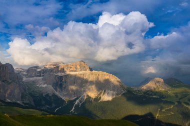 Beautiful cloudscape in the Dolomite mountains in summer