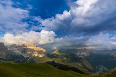 Beautiful cloudscape in the Dolomite mountains in summer