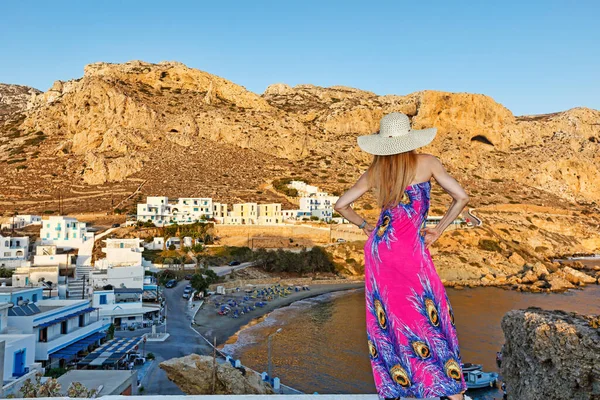 A beautiful woman above the village Finiki of Karpathos, Greece