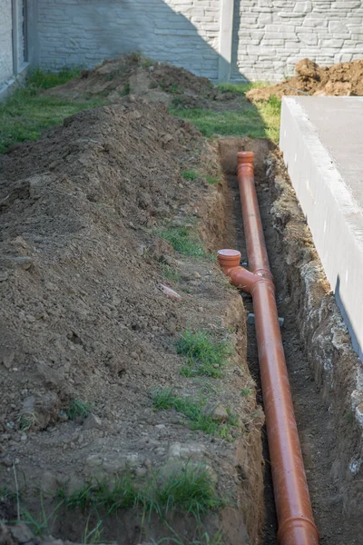 Sewage pipe for a water from the roof