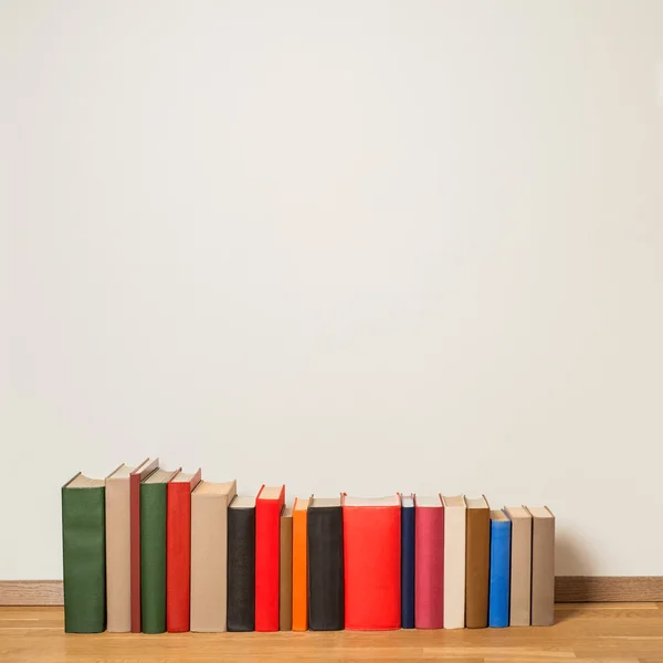 Old books on wooden floor — Stock Photo, Image