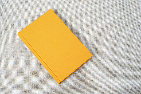 Yellow book on the table