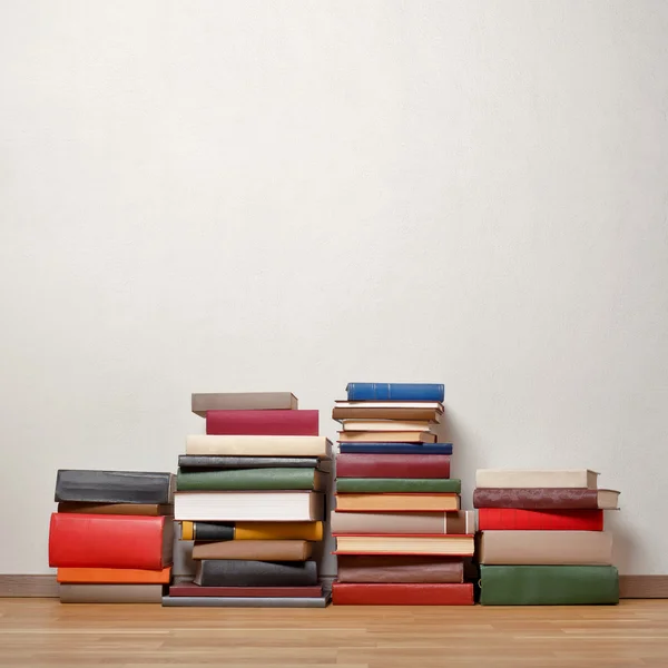 Old books on wooden floor — Stock Photo, Image