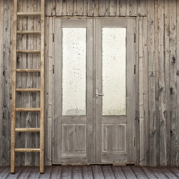 Door with frosty window of plank house — Stock Photo, Image