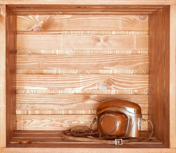 Vintage old camera on shelf — Stock Photo, Image