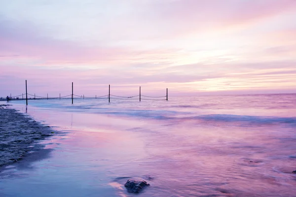 Gyönyörű Rózsa naplemente a tengerparton — Stock Fotó