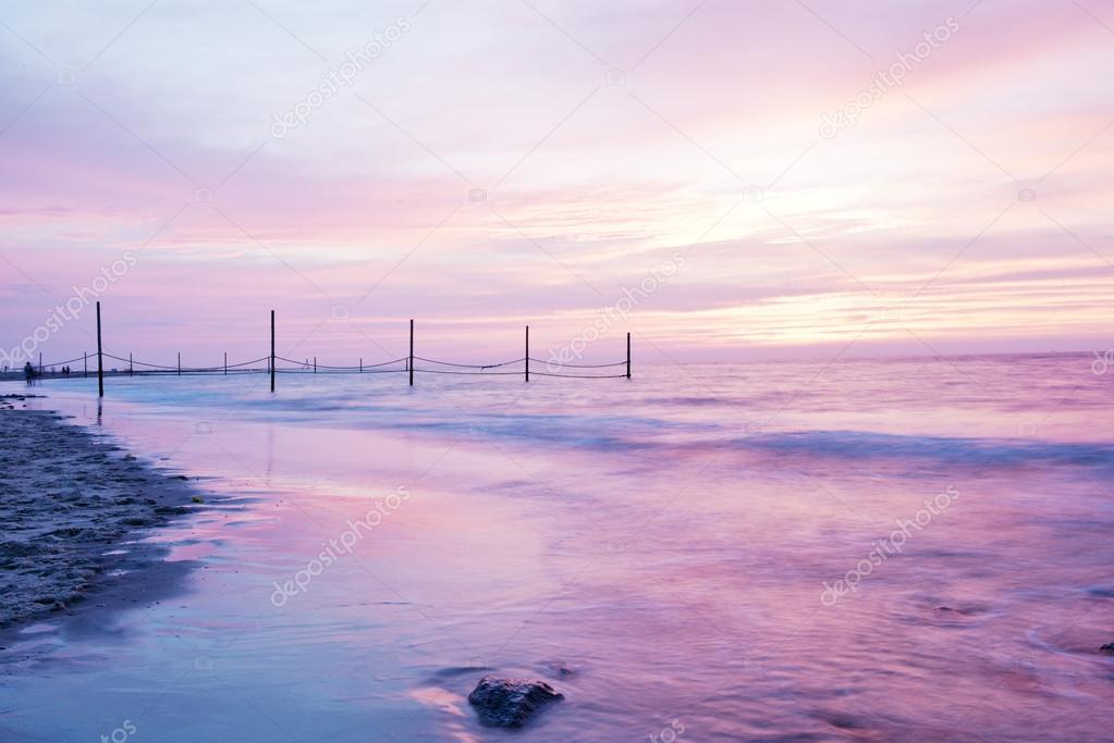 Beautiful rose sunset at a coast